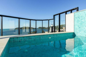 AION 206 - Apartamento em ótima localização - Centro de Bombinhas com Piscina Climatizada